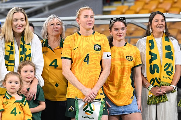 Clare Polkinghorne with her family and friends before the match.