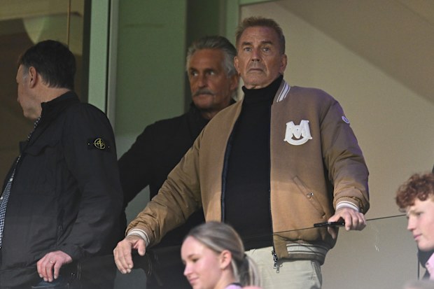 BRISBANE, AUSTRALIA - MAY 08: Kevin Costner is seen during the round nine AFL match between Brisbane Lions and Carlton Blues at The Gabba, on May 08, 2026, in Brisbane, Australia. (Photo by Albert Perez/Getty Images)