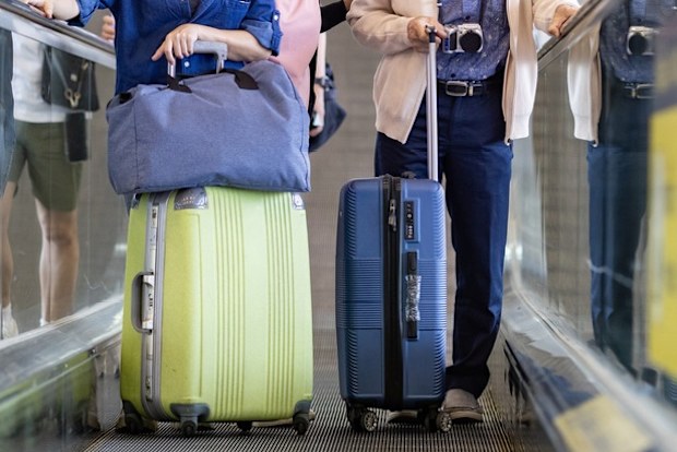 adult family travel costs at airport