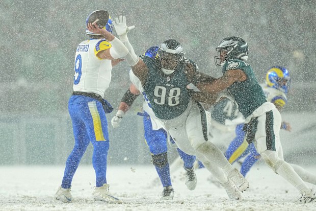 Jalen Carter #98 of the Philadelphia Eagles pressures Matthew Stafford #9 of the Los Angeles Rams during the fourth quarter in the NFC Divisional Playoff at Lincoln Financial Field on January 19, 2025 in Philadelphia, Pennsylvania. (Photo by Mitchell Leff/Getty Images)