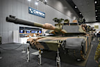 Land Forces Expo at the Melbourne Convention and Exhibition centre. 11 September 2024. Photo: Eddie Jim. ( Bernie Maus WO1 with the M1A2 Abrams tank )