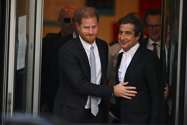 Prince Harry, Duke of Sussex  and barrister David Sherborne leave after giving evidence at the Mirror Group Phone hacking trial at the Rolls Building at High Court on June 7, 2023 in London, England. 