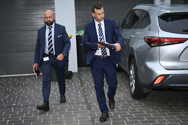 Detectives depart after executing a search warrant at the Bankstown home of one of the nurses in the alleged antisemitic video.