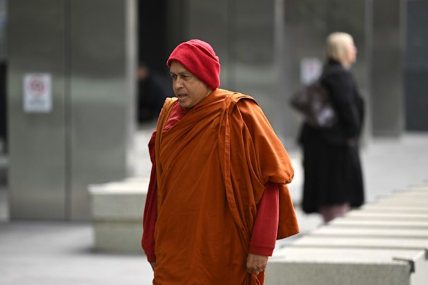 Naotunne Vijitha arrives to the County Court of Victoria in Melbourne, Wednesday, October 8, 2025. Openings expected in trial of 68-year-old Keysborough man Naotunne Vijitha, charged with a total of 19 offences relating to six alleged victims. He is the chief incumbant monk at a Keysborough Sri Lankan temple. (AAP Image/James Ross)