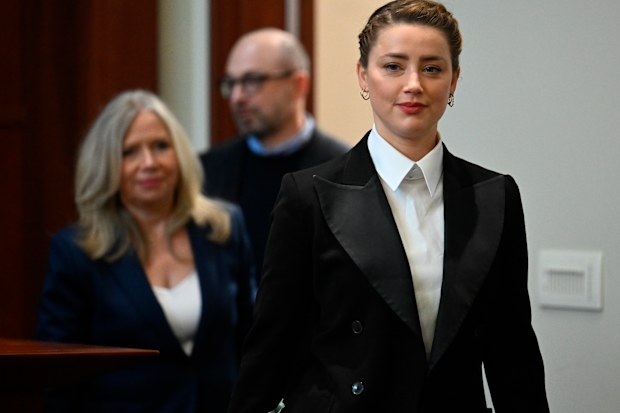 Actor Amber Heard arrives in the courtroom at the Fairfax County Circuit Court in Fairfax, Va., Tuesday May 3, 2022. 