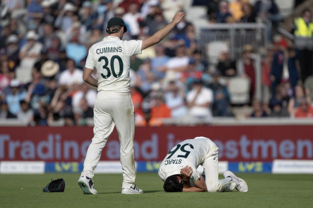 MANCHESTER, ENGLAND - JULY 20: Mitchell Starc of Australia lies on the floor with an injured shoulder during day two of the LV=Insurance 4th Ashes test match between England and Australia at Emirates Old Trafford on July 20, 2023 in Manchester, England. (Photo by Visionhaus/Getty Images) *** Local Caption *** Mitchell Starc