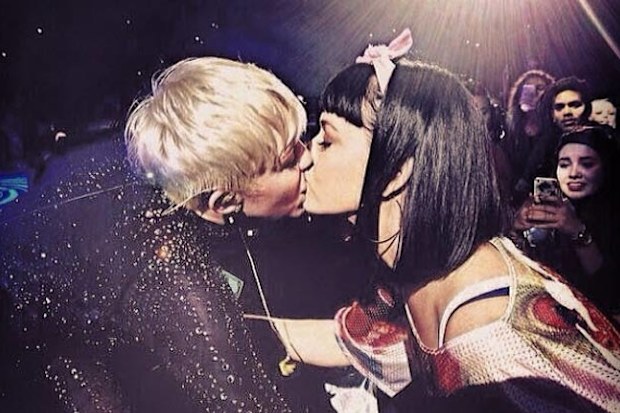 Watch: Miley Cyrus kisses Katy Perry at concert... and she really likes it!
