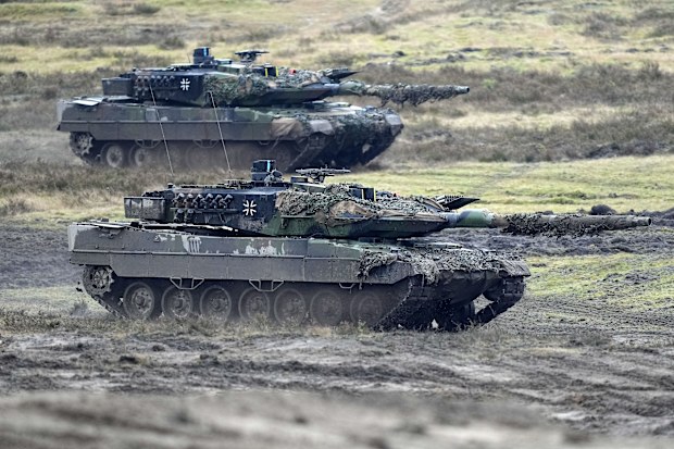 Two Leopard 2 tanks are seen in action during a visit of German Defense Minister Boris Pistorius at the Bundeswehr tank battalion 203 at the Field Marshal Rommel Barracks in Augustdorf, Germany, Feb. 1, 2023.