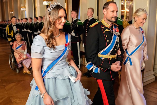 From left, Norway's Princess Ingrid Alexandra, Crown Prince Haakon and Crown Princess Mette-Marit on their way to a gala dinner at the Palace in connection with the state visit of the Icelandic presidential couple, in Oslo, Tuesday, April 8, 2025. (Fredrik Varfjell/NTB via AP)