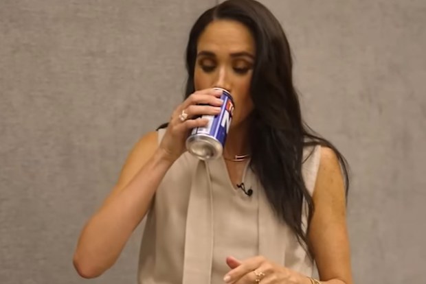 Meghan Markle samples beer during an appearance on YouTube show Get Down with Sean and Marley.