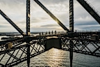 <p>Sydney Harbour Bridge's BridgeClimb has announced its first major suit redesign in over 12 years.</p><p>Created in collaboration with First Nations' artist Taleena Simon, the design reflects Gadigal Country, showcasing whales, fisherwomen in Nawi canoes, and gathering circles symbolising shared climber experiences.﻿</p><p>"I wanted to create a piece that not only celebrates the beauty of the landscape but also honours the ancestral connections ﻿and stories of the Indigenous peoples who have called this land home for millennia," said Simon, who is a proud Worimi and Bundjalung woman.</p>