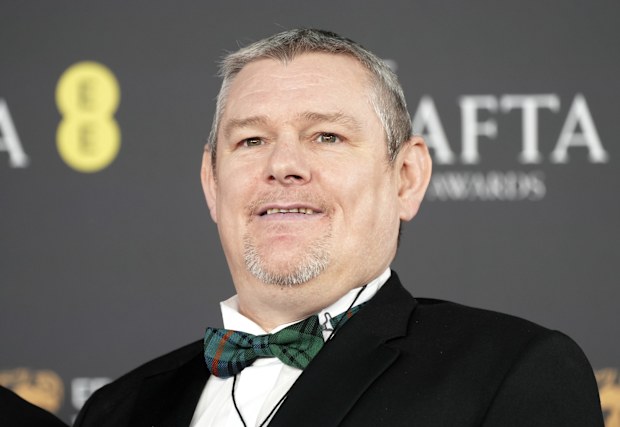 John Davidson attends the 2026 EE BAFTA Film Awards at The Royal Festival Hall on February 22, 2026 in London, England.