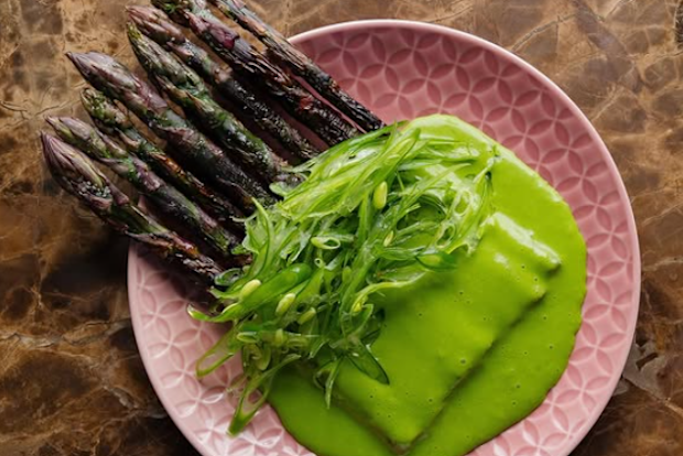 Barbecued purple asparagus, haricot vert, miso parsley sauce at Bar Magda, Auckland,