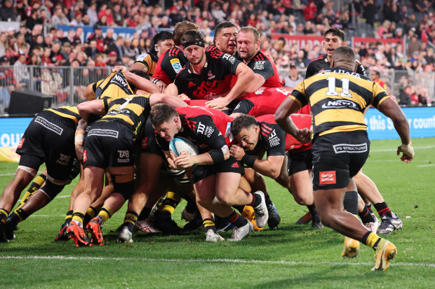 Brodie McAlister dives to score his third try off a maul during the round 11 Super Rugby Pacific match between Crusaders and Western Force.