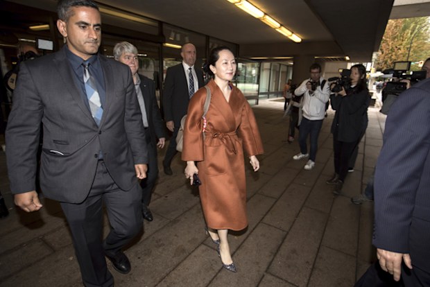 Huawei chief financial officer Meng Wanzhou, who is out on bail and remains under partial house arrest after she was detained last year at the behest of American authorities, leaves court during a lunch break from a hearing, in Vancouver.