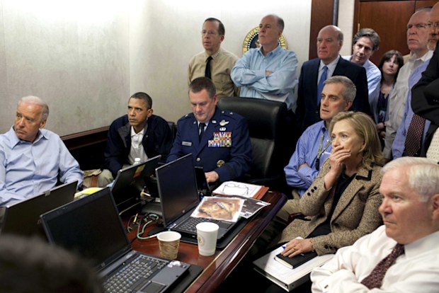 President Barack Obama and a team of his close advisors receive an update on the mission against Osama bin Laden in the Situation Room of the White House in Washington. 