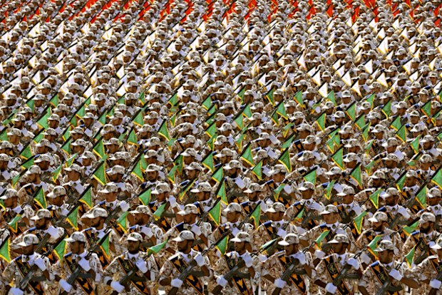 Members of the Iran's Revolutionary Guard march during an annual military parade at the mausoleum of Ayatollah Khomeini, outside Tehran, Iran.