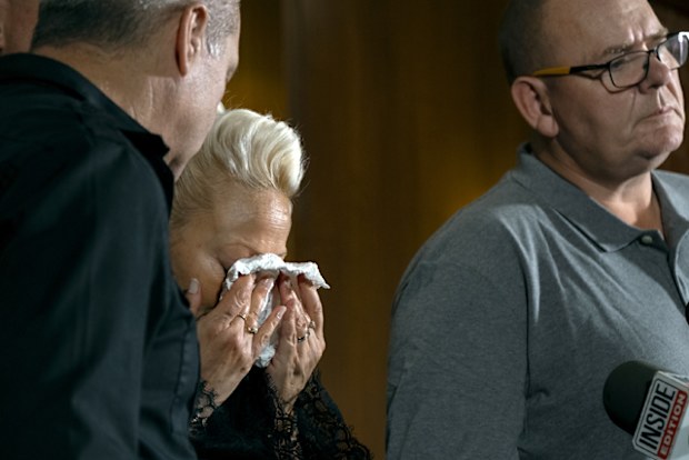 Charlotte Charles, mother of Harry Dunn, who died after his motorbike was involved in an August 2019 accident in Britain allegedly with Anne Sacoolas, wipes her eyes at a news conference as she is joined by family members and supporters in New York.
