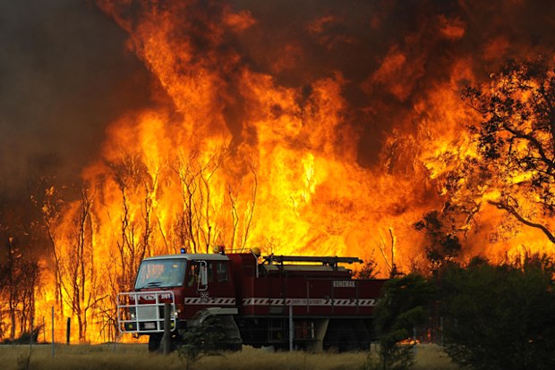 A 2009 file photo showing fire fighters battling bushfires at the Bunyip State Forest near the township of Tonimbuk, Victoria. The Black Saturday bushfires claimed the lives of at least 173 people.