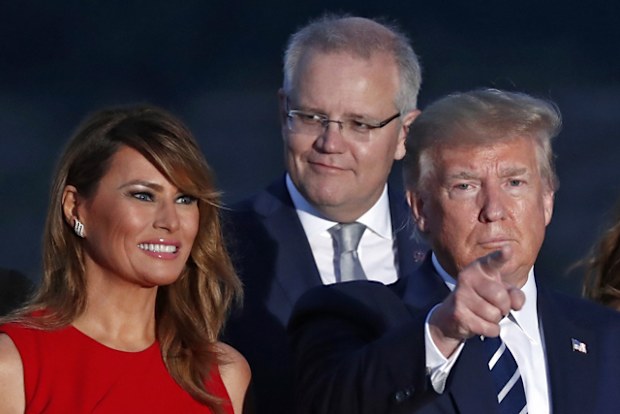 US President Donald Trump, his wife Melania Trump and Australian Prime Minister scott Morrison pose for the leaders photo during the G7 summit in Biarritz, France.