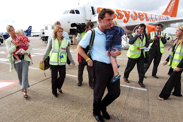 Kate and Gerry McCann, with twins Sean and Amelie, arrive at East Midlands airport in England in September 2007, after leaving Portugal.