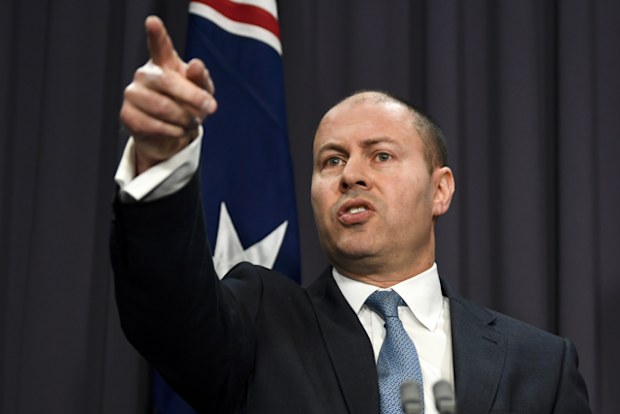 Australian Federal Treasurer Josh Frydenberg speaks during a press conference as he hands down the Mid-Year Economic and Fiscal Outlook 2019/20 at Parliament House in Canberra.