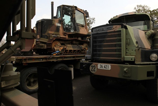 An Australian Defence Force MACK Truck and bulldozer to be used by Australian Army Reserve and Regular personnel