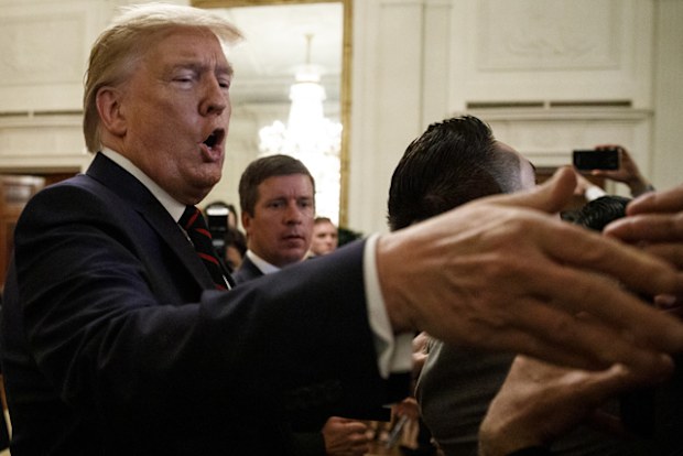 President Donald Trump greets people in the audience at the Hispanic Heritage Month Reception in the East Room of the White House in Washington, September 27, 2019