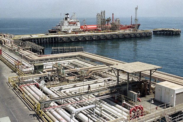 Pipelines snake through the port area of the Aramco facility at Ras Tannura, Saudi Arabia. 