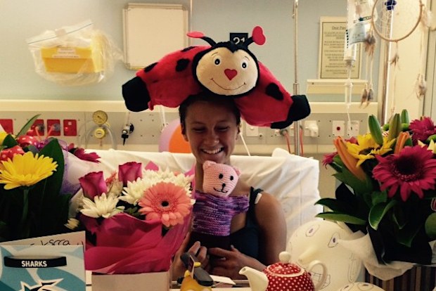 Kirra-Belle Olsson in hospital after the shark attack.