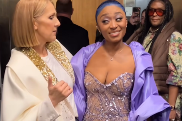 Celine Dion performs with Sonyae Elise backstage at grammys