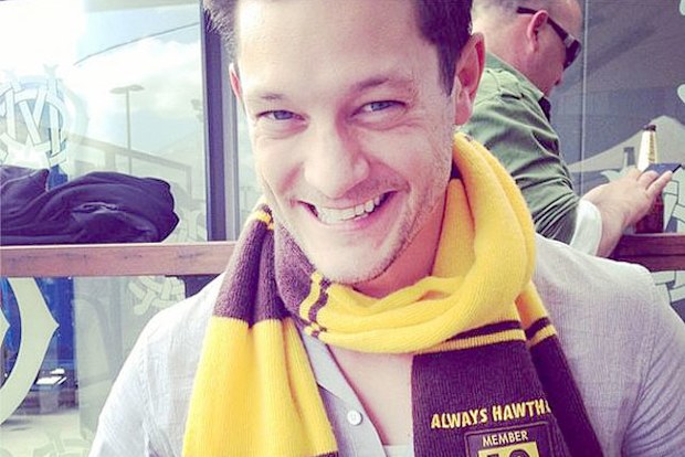 Rob Mills dressed in Hawthorn Hawks colours during the AFL grand final. (Instagram)