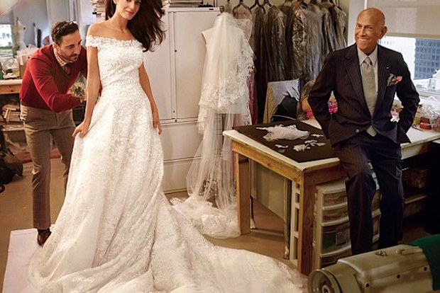 Oscar De La Renta poses at the final wedding dress fitting of Amal Clooney, who wed in Venice this month. (Vogue)