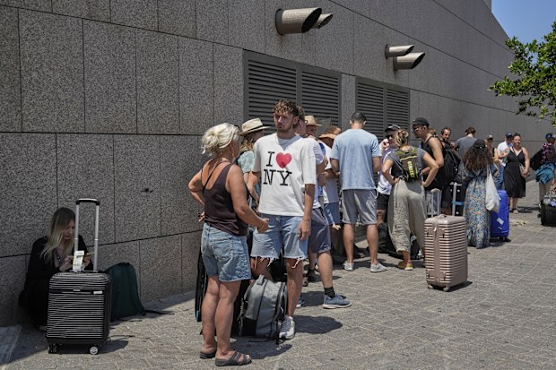 Citizens of Poland and Austria assemble at a hotel in Tel Aviv