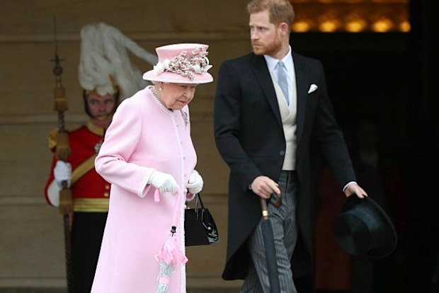 Queen walking with Prince Harry