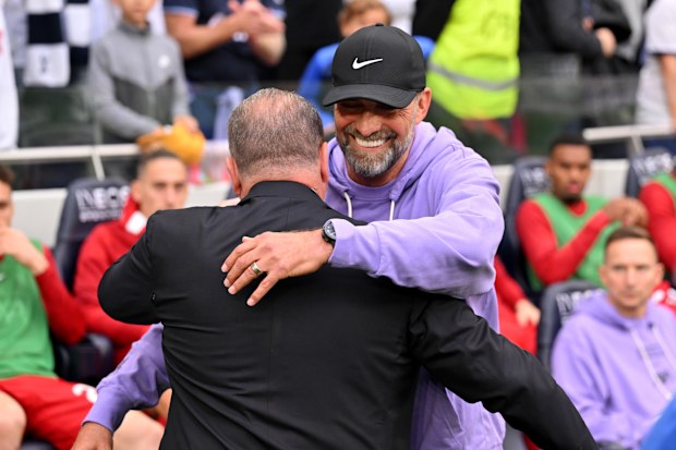 Jurgen Klopp manager of Liverpool embracing Ange Postecoglou manager of Tottenham Hotspur before the Premier League match between Tottenham Hotspur and Liverpool FC at Tottenham Hotspur Stadium on September 30, 2023 in London, England. (Photo by Andrew Powell/Liverpool FC via Getty Images)