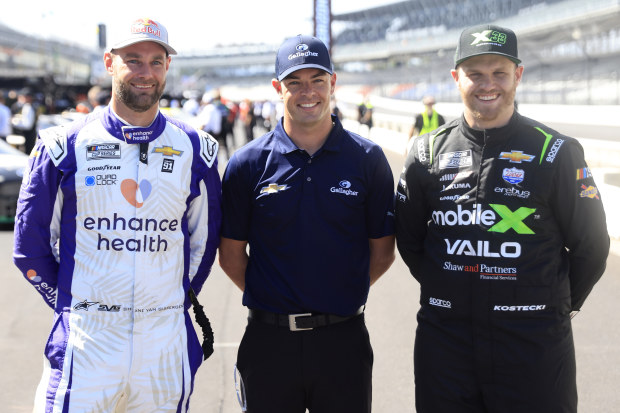 Shane Van Gisbergen (left) with Scott McLaughlin (middle) and Brodie Kostecki at Indianapolis Motor Speedway in 2023.