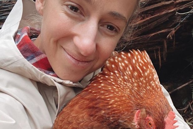 Samantha with one of her chickens who survived the brutal storms in regional Victoria.