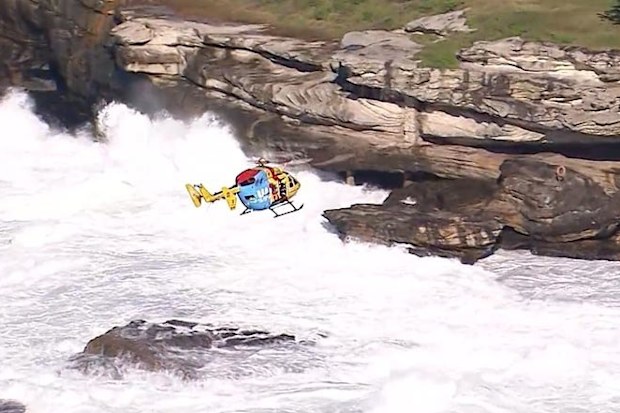 A search has resumed for a 24-year-old swept off rocks in Sydney.