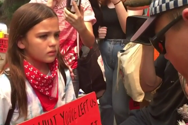 The 13-year-old was threatened with arrest by an officer in a video that has since gone viral.