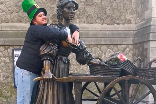 Tourists grope the Molly Malone statue in troubling tradition