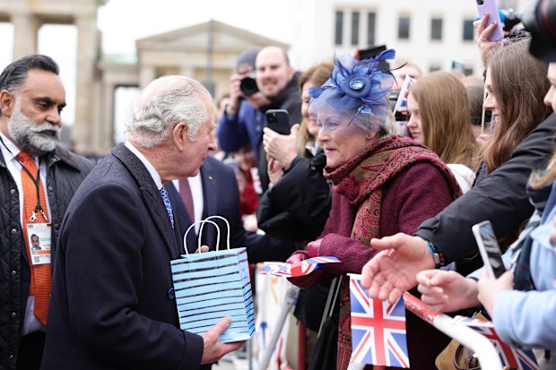 King Charles III meets members of the public during the Ceremonial welcome at Brandenburg Gate on March 29, 2023 in Berlin, Germany.  