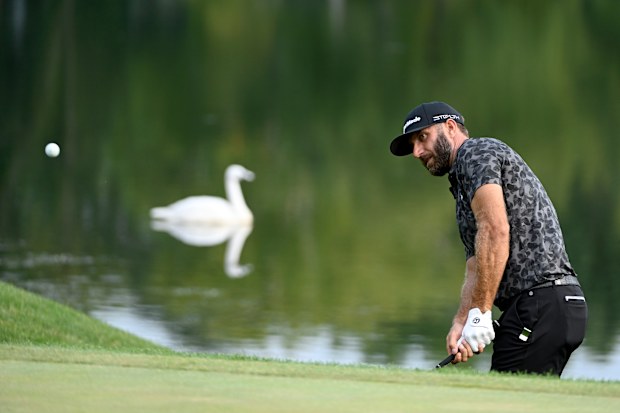 Team Captain Dustin Johnson of 4 Aces GC chips onto the 17th green during Day Two of the LIV Golf Invitational - Chicago at Rich Harvest Farms on September 17, 2022 in Sugar Grove, Illinois. (Photo by Charles Laberge/LIV Golf via Getty Images )