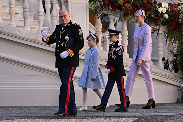 Prince Albert II of Monaco, Princess Gabriella of Monaco, Prince Jacques of Monaco and Princess Charlene of Monaco attend the Monaco National Day celebrations in the courtyard of the Monaco palace on November 19, 2024 in Monaco, Monaco. (Photo by Stephane Cardinale/PLS Pool/Getty Images)