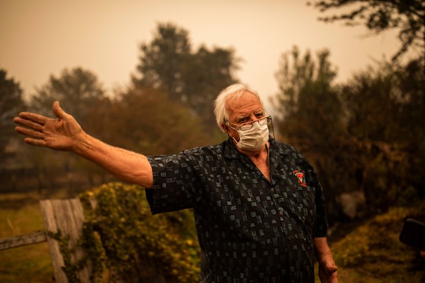 Roland (Roly) Hough in Cobargo, NSW, Wednesday, January 1, 2020. Several bushfire-ravaged communities in NSW have greeted the new year under immediate threat. (AAP Image/Sean Davey) 