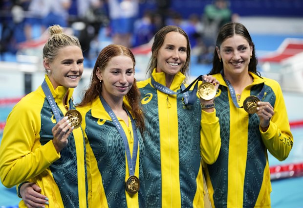 Australia's Shayna Jack, Mollie O'Callaghan, Emma Mckeon and Meg Harris, from left, celebrate after winning the women's 4x100-meter freestyle relay final at the 2024 Summer Olympics, Saturday, July 27, 2024, in Nanterre, France.