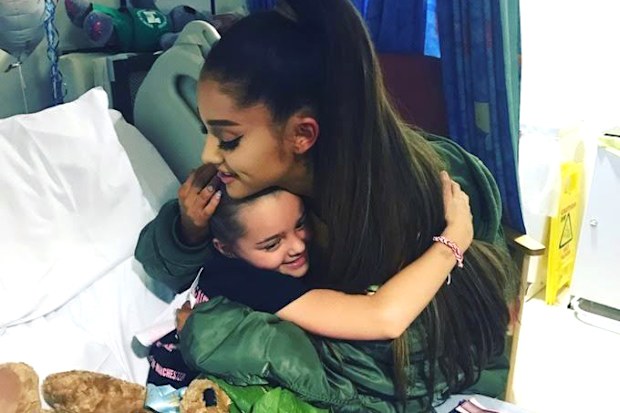 Victim of the Manchester concert blast Lily Harrison hugs singer Ariana Grande during her visit to the Royal Manchester Children's Hospital. Grande surprised young fans injured in the Manchester Arena attack, hugging the thrilled little girls in their hospital beds as they recovered from injuries sustained in the May 22, 2017 suicide bombing. The attack killed 23 people.