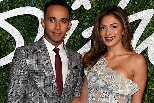 Lewis Hamilton and Nicole Scherzinger attend the British Fashion Awards at London Coliseum on December 1, 2014 in London, England.