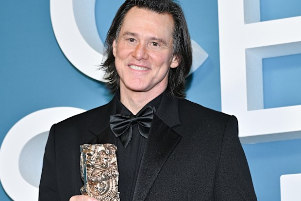 Jim Carrey with the award he received at the 51st Cesar Film Awards in Paris on February 26, 2026.