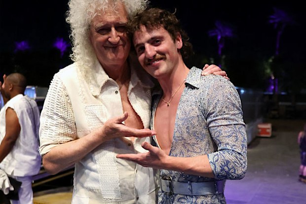 INDIO, CALIFORNIA - APRIL 11: (FOR EDITORIAL USE ONLY) Brian May and Benson Boone pose backstage at the Coachella Stage during the 2025 Coachella Valley Music and Arts Festival at Empire Polo Club on April 11, 2025 in Indio, California. (Photo by Kevin Mazur/Getty Images for Coachella)